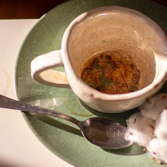 cup of delicious broth based soup almost empty