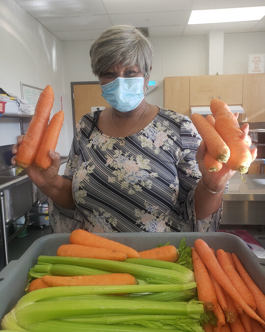 prepping fresh ingredients for purpose and hope soup delivery