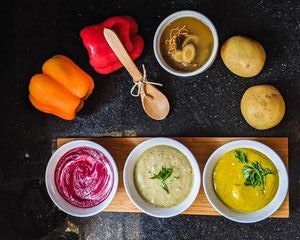 three brightly colored healthy soups from purpose and hope soup delivery